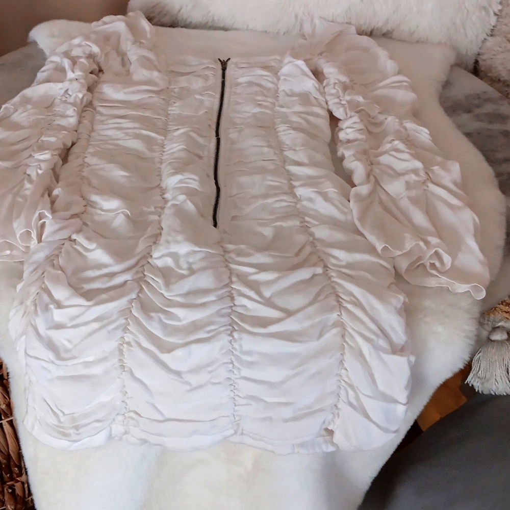 Woman white ruched dress long sleeves with split on bottom sleeves